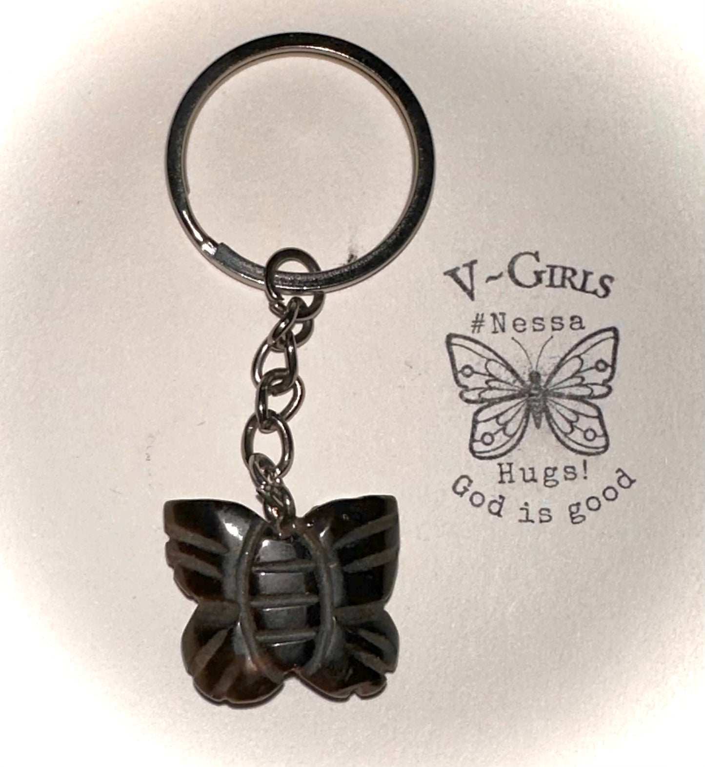 Keychain is a carved butterfly out of tiger eye stone!